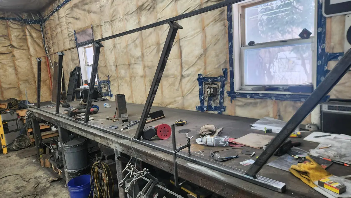 Multiple railing frames on welding bench