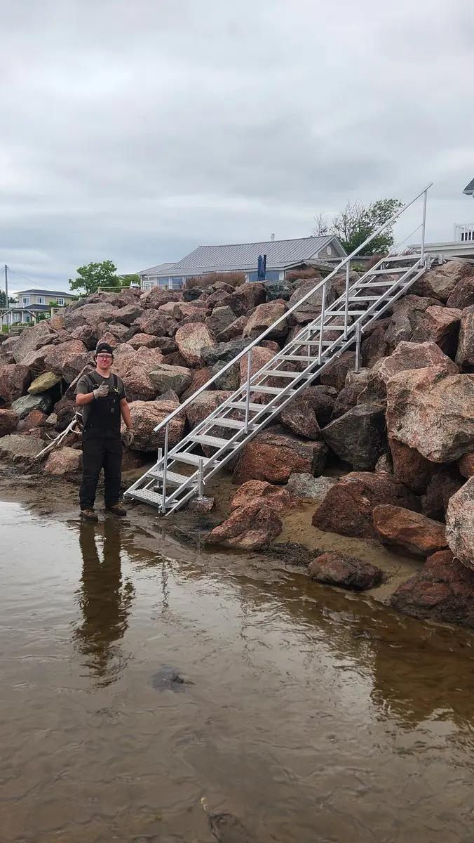 Trevor installing beach stairs
